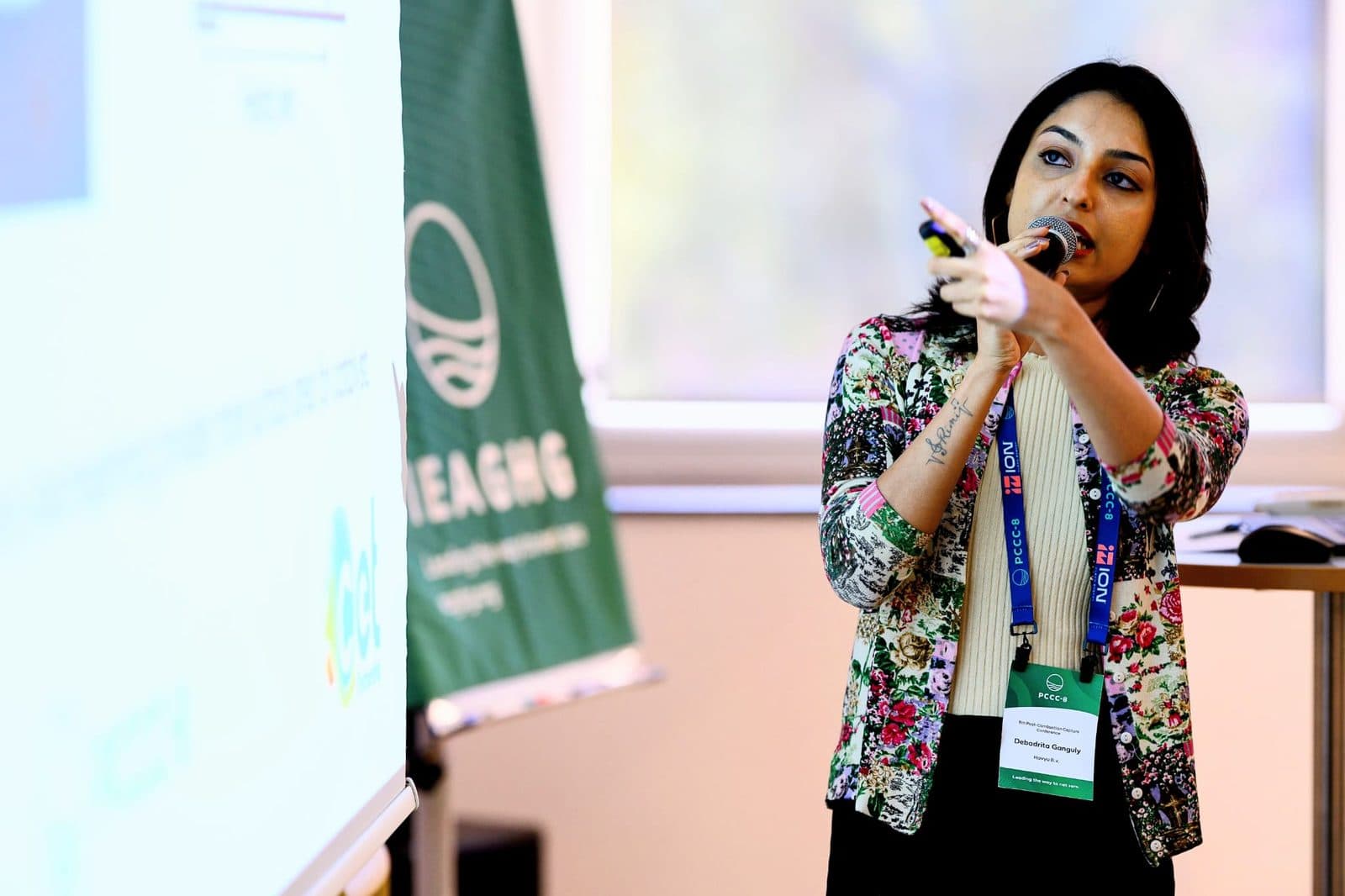 Hovyu engineer presenting ZEUS results at the PCCC-8 conference